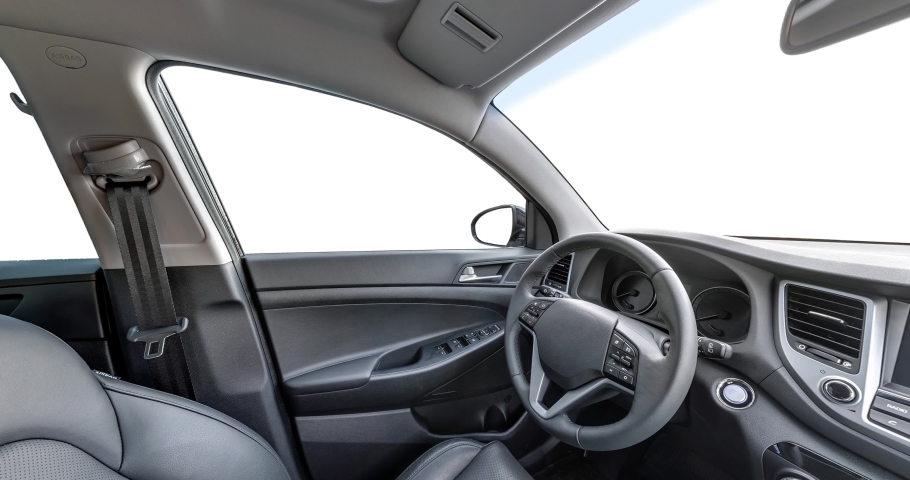 panorama in interior leather salon of prestige modern car. steering wheel, shift lever and dashboard isolated on white background Royalty-Free Stock Footage #1042188358