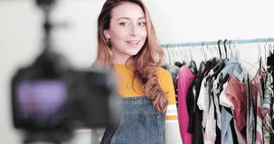 Vlogger recording fashion video at home