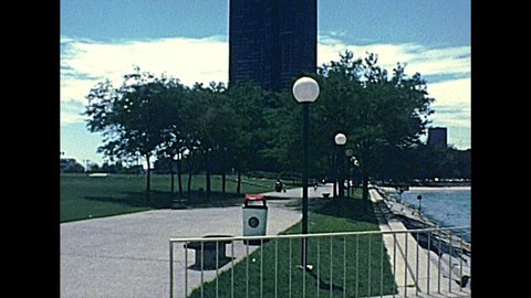 Chicago, Lake Michigan, Illinois, United States - Circa 1977: waterfront with Lake Point Tower of Chicago city in 70s, from the Milton Lee Olive Park. Historical United States of America.