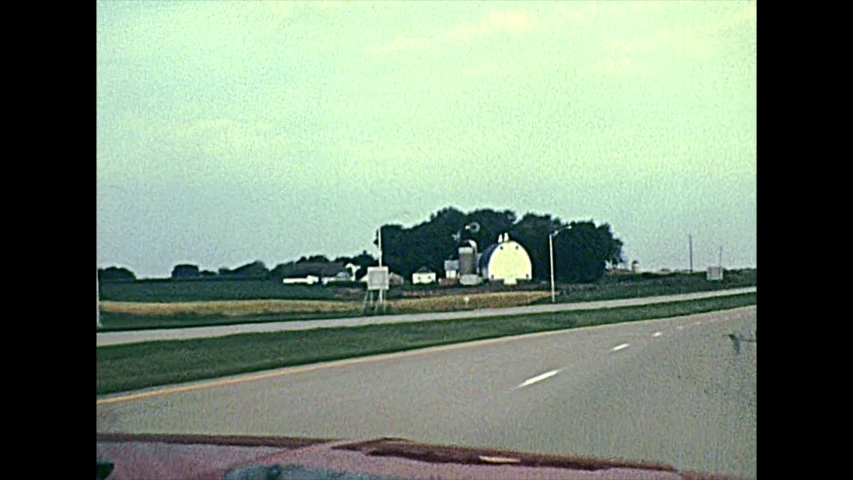 Minnesota windmills and farms on the State Highway MN 43 in the 1970s. The historical countrysides of the United States of America.