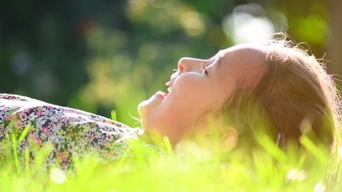 Beautiful Teenage Girl Lying On Field Stock Photo (Edit Now) 593604158