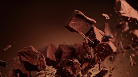 Super Slow Motion Shot of Raw Chocolate Pieces and Cocoa Powder after Being Exploded at 1000fps.