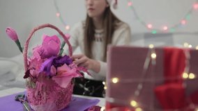 Blogger makes a Christmas video at home. As a hobby, he shows how to make a Christmas present or paper decoration at home.