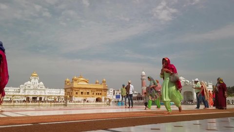 Amritsar, India - Circa October 2019. Beautiful view of Golden temple in Amritsar. Timelapse video.