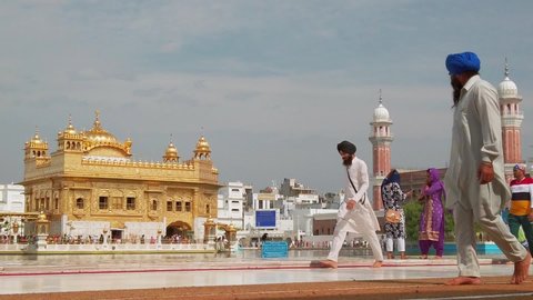 Amritsar, India - Circa October 2019. Beautiful view of Golden temple in Amritsar. Slow motion video.