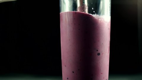 Wildberries Milk Shake With Fruits. Healthy Vegan Protein Cocktails Smoothie With Fruits. Slimming Woman Smoothie Blended . Blender Milk , Banana And Strawberry For Healthy Milk Shake Fitness Cocktail