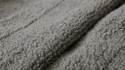 Fine texture of grey towel with lot of details 4K tilting footage