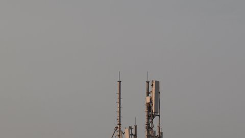 Tilt Down Revealing One Telecommunication Tower.