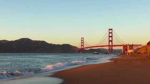 The Golden Gate Bridge as seen from Baker Beach at sunset, San Francisco, California, USA, 2018
