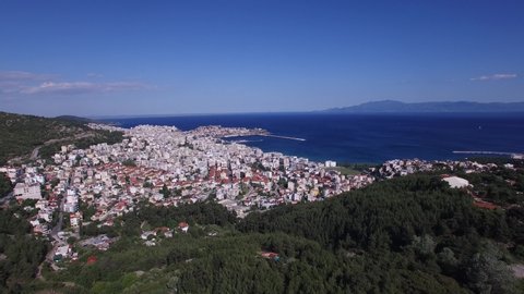 Long aerial shot of Kavala city and Kavala Bay. Greece.  