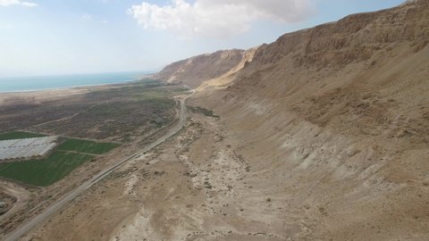 Dead Sea shore, mountains and road near Qumran. Israel. 