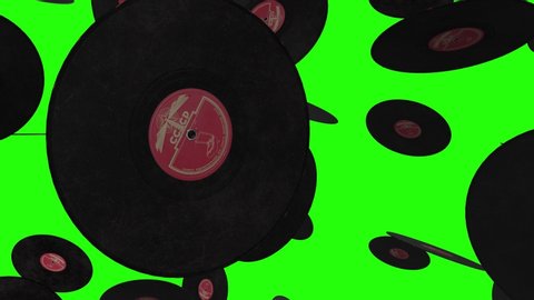 Rain of 3d Black vinyl records falling on green screen background. Long play lp disk with blank label in red on chroma key. Music vintage concept. Close up view. Abstract Retro theme animation in 4k.