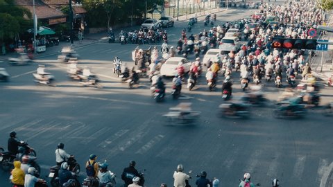 Stock 4k. Time lapse or timelapse traffic from morning to night in Ho Chi Minh city, Vietnam. Multiple scenes time lapse footage of people, life, traffic from day to evening in the financial district