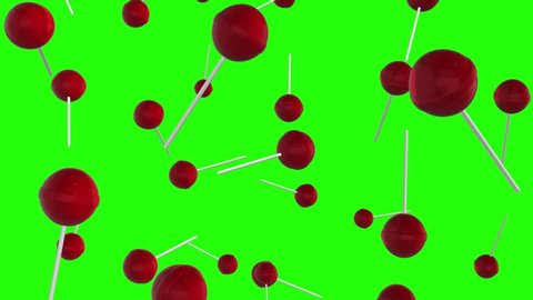 Rain of 3d red sweet lollipops falling on green screen background. Round candies on stick on chroma key. Sweet candy caramel concept. Close up view. 4k animation