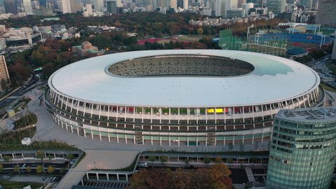 TOKYO, JAPAN - END OF 2019: Aerial view of New National Stadium, fully completed main stadium for Olympic Summer Games 2021 (originally 2020) at sunset.