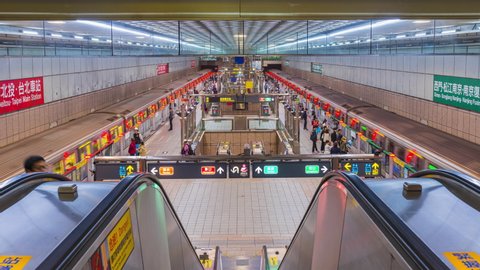 TAIPEI, TAIWAN - DECEMBER 6, 2019:
Interior view of Chiang Kai-shek MRT Station with a lot of passengers in Taipei, Taiwan
