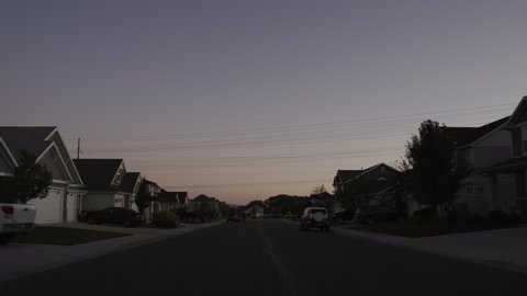 Zoom out from empty neighborhood street / Lehi, Utah, United States