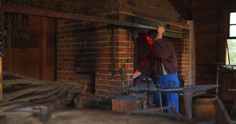 Mount Vernon, Virginia / USA - November 13, 2019: Blacksmith, Historical Reenactment at Mount Vernon, Slow Motion