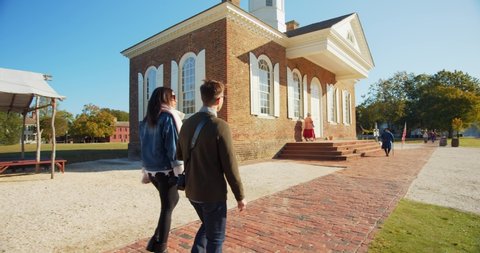 Williamsburg, Virginia / USA - November 17, 2019: Diverse Couple, Tourists, on Vacation in Colonial Williamsburg