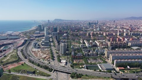 Panoramic aerial view of modern area of Diagonal Mar i el Front Maritim del Poblenou in coastal zone of Barcelona, Spain