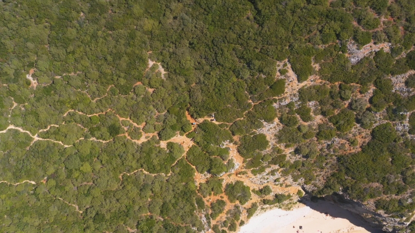 Landing To Green Ocean Cliff. Aerial View. Praia Ribeira, Portugal