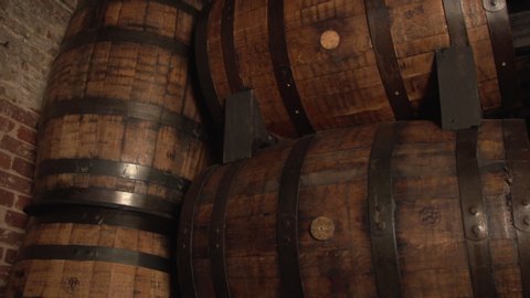 Multiple Bourbon Barrels Stacked together-Pan Down