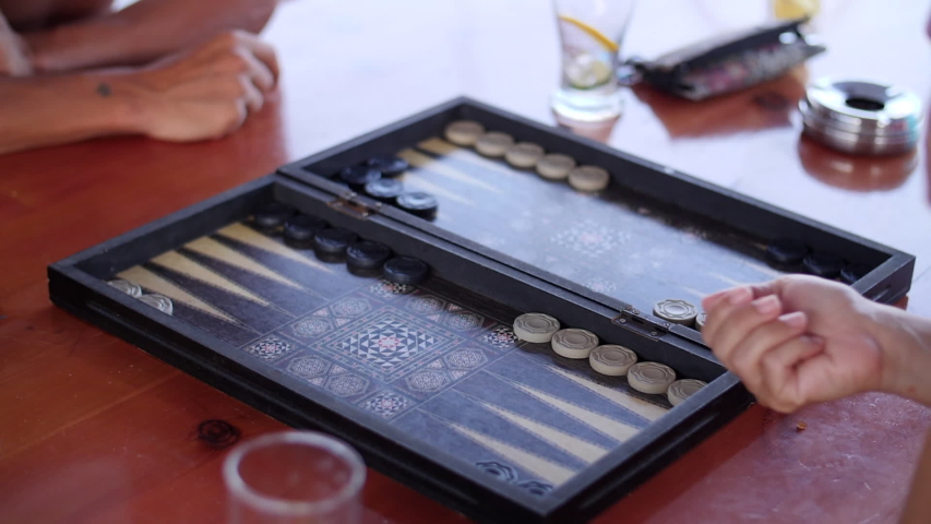 Two People Playing Backgammon in Extreme Slow Motion