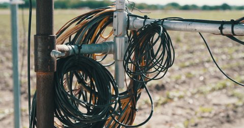 Data cables at agricultural weather station on farm