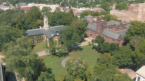 Aerial: Establishing shot of Princeton University campus. Princeton, New Jersey, USA. 25 August 2019 