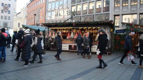 Munich,Germany- December 06,2019: People walk in Munich's Christkindlmarkt Christmas Market