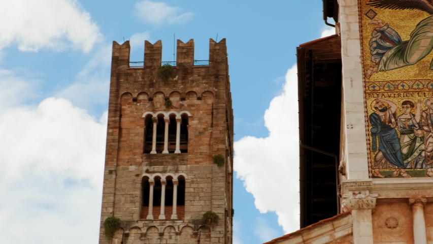 Close-up shot of the stunning San Frediano Basilica in Lucca, Tuscany, Italy, dating from 1112 with a monumental golden facade