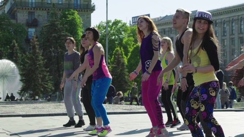 KYIV, UKRAINE - MAY 15, 2016. Dance aerobics in the open air. Slow motion. Kyiv. Ukraine