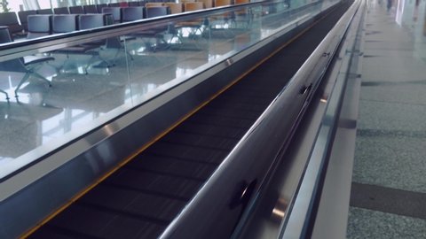 Moving walkway or travelator in the airport
