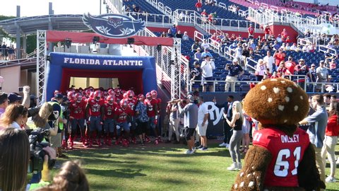 Boca Raton, Florida/USA - December 07, 2019: Florida Atlantic Owls vs UAB Blazers. 2019 Ryan C-USA Football Championship. College Football players on the field at FAU Stadium. Football footage.
