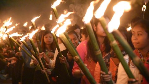 Guwahati, Assam, India. 8 December 2019. Activists of All Assam Students Union (AASU) holding torches raise slogans during a protest over the Citizenship Amendment Bill, 2019 (CAB) in Guwahati.