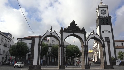 Ponta Delgada, Sao Miguel Island, Azores / Portugal - SEPTEMBER 19, 2019:
Road traffic near the Ponta Delgada City Gates (Portas da Cidade).