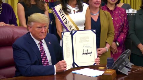 CIRCA 2019 - President Trump Participates in a Signing Ceremony for the Woman's Suffrage Centennial Coin Act.