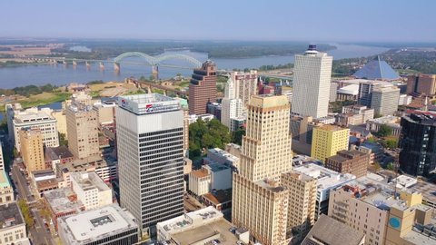 MEMPHIS, TENNESSEE - CIRCA 2010s - Good aerial of downtown Memphis Tennessee, high rises, skyscrapers, businesses, skyline and Mississippi River.