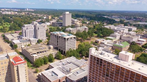 JACKSON, MISSISSIPPI - CIRCA 2010s - Very good aerial over the Mississippi State Capitol building in Jackson, Mississippi.
