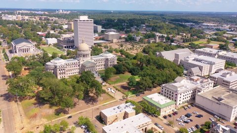 JACKSON, MISSISSIPPI - CIRCA 2010s - Very good aerial over the Mississippi State Capitol building in Jackson, Mississippi.