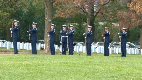 WASHINGTON D.C. - CIRCA 2010s - a patriotic military funeral in Arlington Cemetery, Washington D.C., includes a 21 gun salute.
