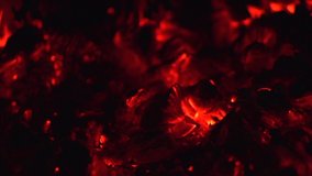 Burning charcoal background. Burn coals at night closeup, Fire, fireplace. Slow motion 4K UHD video