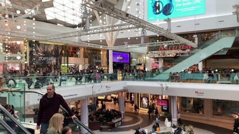 London, United Kingdom - 12/08/2019: Shoppers inside the Westfield White City Shopping Centre in West London during Christmas.