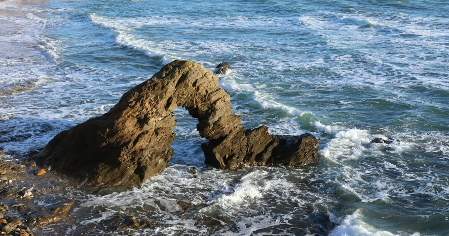 Rocky arch on the coast of la Pointe du Payre in Jard-sur-Mer (Vendee, France)