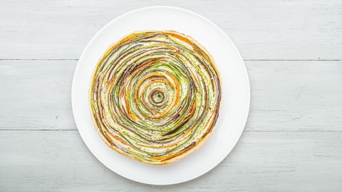 step-by-step preparation of a classic ratatouille pie.