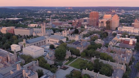 Aerial: Yale University campus at sunset. New Haven, Connecticut, US. 26 August 2019 