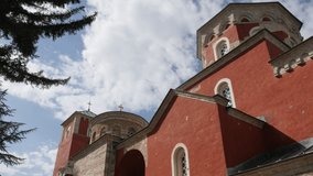 Beautiful red facade color of Zica monastery slow pan 4K video