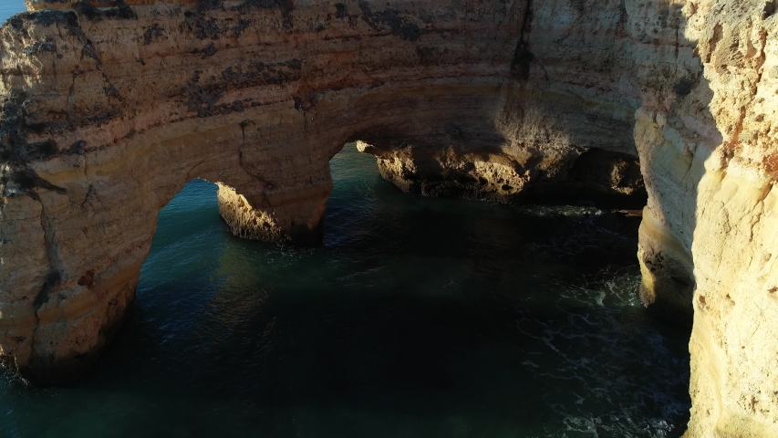 La Marina Beach and Cliffs from aerial view in Algarve Portugal.