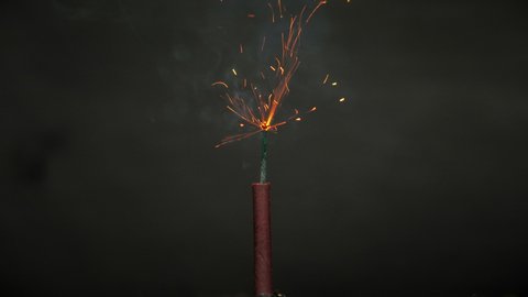 Burning fuse with final firecracker explosion