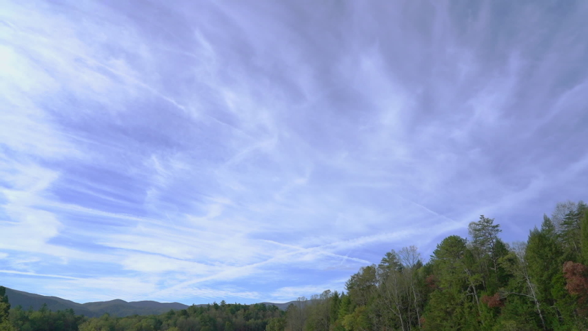 Wide, low angle, timelapse, fair weather cloudscape over Great Smoky Mountains, USA